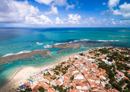 Aerial view of a town by the beachの写真素材