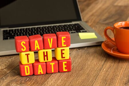 Save the date in front of a laptopの写真素材