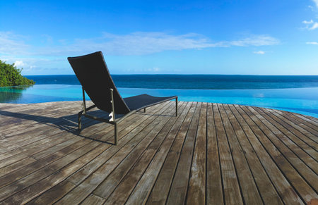 Infinity pool with views of the sea and blue sky