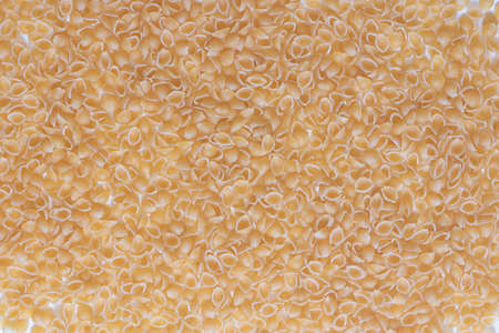 Italian pasta (macaroni) isolated on white background. Detail of the textureの写真素材