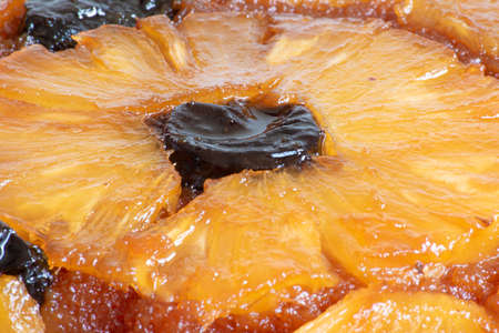 Caramelized pineapple cake with plums. Texture. Close-upの写真素材