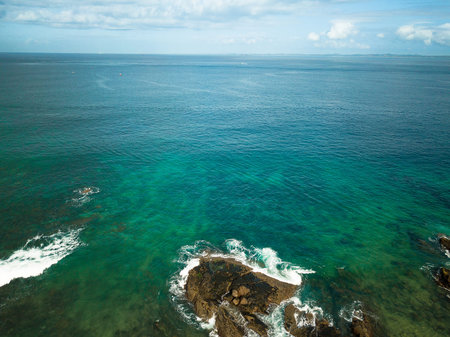 Aerial view of sea with crystalline green waters.