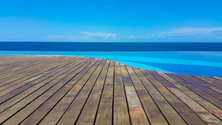 Infinity pool with views of the sea and blue skyの写真素材
