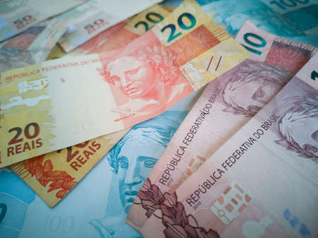 Brazilian money. Money bills of different values stacked. Finance conceptの写真素材