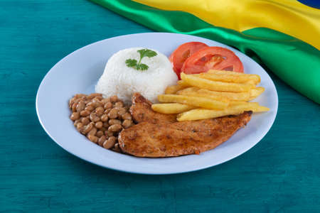 Traditional Brazilian food dish. Blue background. Copy spaceの写真素材