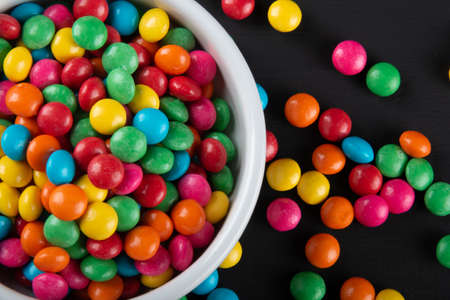 Colorful candy. Colorful sweets background. Black backgroundの写真素材