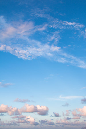 White clouds with blue sky in the backgroundの写真素材