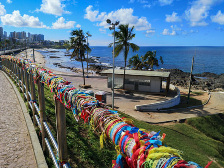 Senhor do Bonfim colorful ribbons tied in a grid at Barra Lighthouse Salvador Bahia.の写真素材