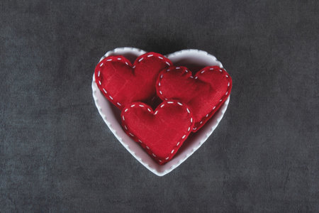 Valentine's day background with red heart and gray backgroundの写真素材