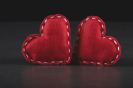 Valentine's day background with red heart and gray backgroundの写真素材