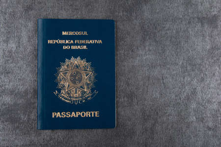 Brazilian passport on gray background with copy space.の写真素材