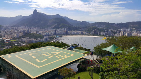 Aerial view of rio de janeiro with helicopter runway on sugar loaf.