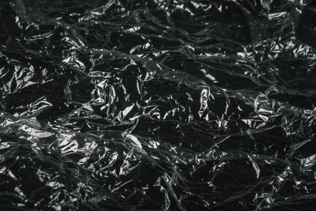 Black background with shiny texture.