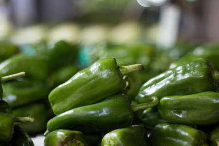 Green peppers for sale at the Fair.の写真素材