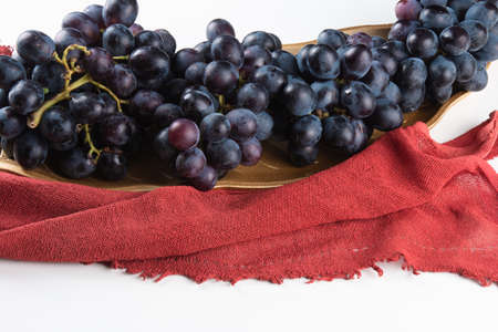 Purple fruit grape isolated on white background.の写真素材