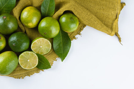 Ripe green lemon fruit on white background.