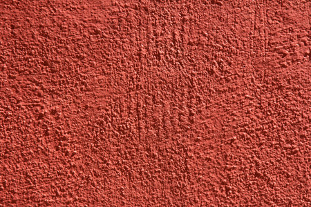 Background with wall texture with red paintの写真素材
