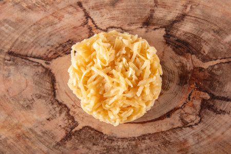 Coconut Candy on Rustic Wood Background.