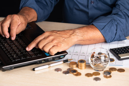 Businessman using laptop computer. business and finance concept.の写真素材