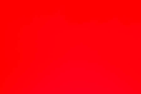 Vivid blurred colorful red wallpaper background.の写真素材