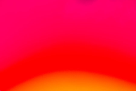 Vivid blurred colorful pink wallpaper background.