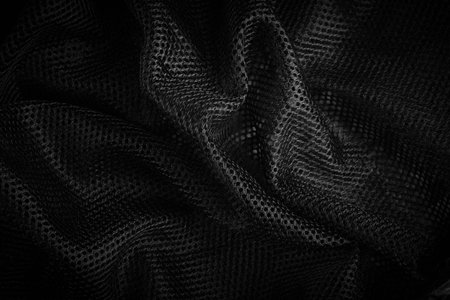 black fabric texture. wavy textured background.