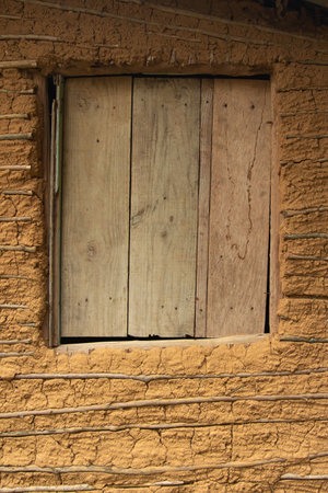 Detail of a typical mud house window.の写真素材
