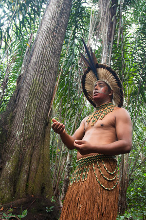 Ilheus, bahia / brazil - September 12, 2023: portrait of Indian TupinambÃ¡ with paint on his face and typical clothing.のeditorial素材