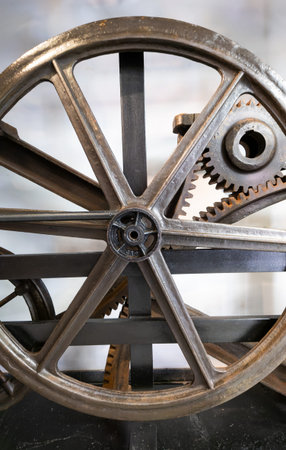Antique iron wheel gear system.