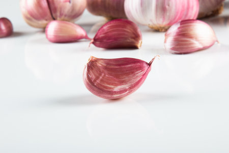 Closeup Garlic clove and bulb isolated on white background..の写真素材
