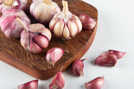 Closeup Garlic clove and bulb isolated on white background..の写真素材