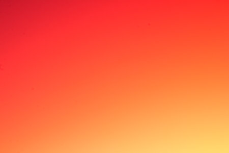 Orange gradient background. Shades of yellow and orange. Modern design template for web covers, ad banners, posters, brochures, flyers.の写真素材