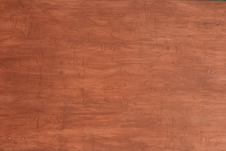 Rustic toned wooden surface red and weathered texture.の写真素材