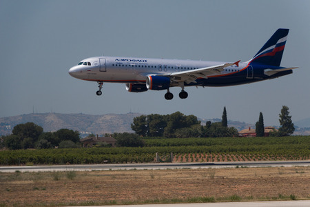 Manises, Spain - June 16, 2016: Aeroflot Airbus A320 landing at Manises airport in Valencia, Spainのeditorial素材