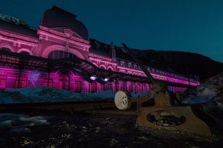 Old train station of Canfranc on a winter night with snow on the tracks, Huesca, Arag?n Spainのeditorial素材