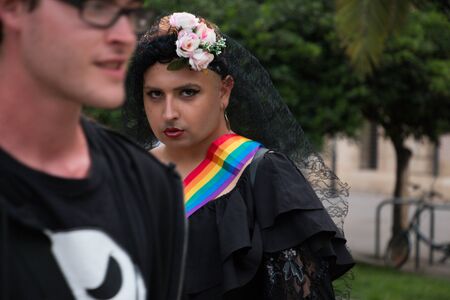 Valencia, Spain - June 16, 2018:  A person with a dress on gay pride dayのeditorial素材