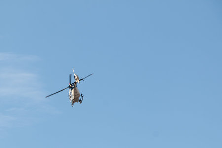 Helicopter of the Spanish national police, model Eurocopter EC 135P2 +, in surveillance tasks during...
