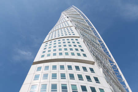 Low angle image of the Turning Torso building in Malmo, Sweden with blue sky in the background. Architecture conceptのeditorial素材
