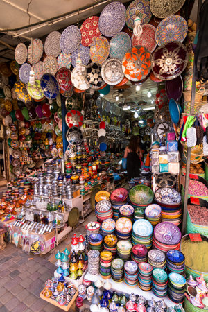 Marrakesh, Morocco - March 13, 2018: Typical ceramic shop in the Marrakesh souk with a multitude of colorful pieces on displayのeditorial素材