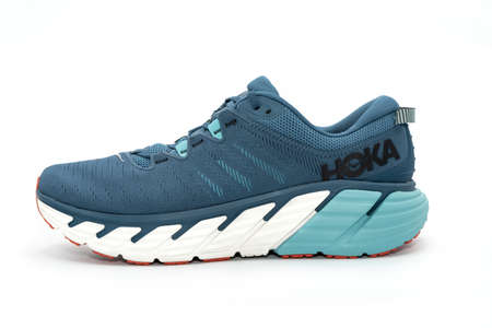 Valencia, Spain -November 7, 2021: Studio shot of a lateral view of Hoka One One Gaviota 3 running shoe over white backgroundのeditorial素材