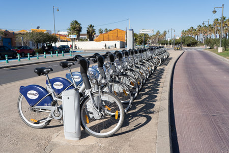 Valencia, Spain; February 22 2021: Bike station of Valenbisi, the public bicycle rental company in the city of Valencia.のeditorial素材