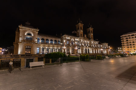 San Sebastian, Spain - April 17, 2022: Nightscape of City Hall illuminated in ancient historic Spanish city of San Sebastian (Donostia) in Basque Countryのeditorial素材
