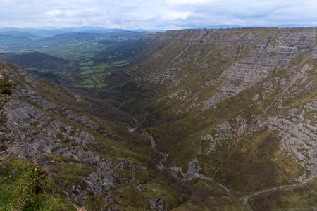 Aerial view of Delika Canyon with the Nervion River snakeing through its steep walls in Alava, Basque Country in Spain. Nature concept to promote tourism and outdoor activitiesの写真素材