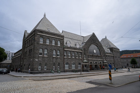 Bergen, Norway - August 8, 2022: Exterior of Bergen train station, a historic landmark in the heart of Bergen, Norway. An elegant, stone-built station connect Bergen with Oslo and other destinationsのeditorial素材