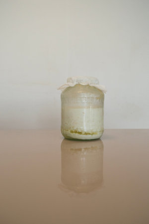 a glass jar with sourdough for pastry