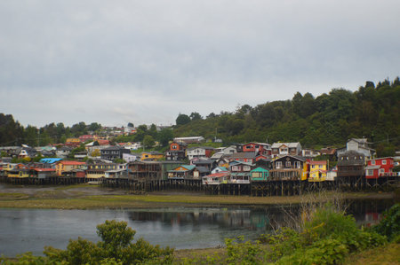 several colorful houses in a fishing village in Chiloe in Chile