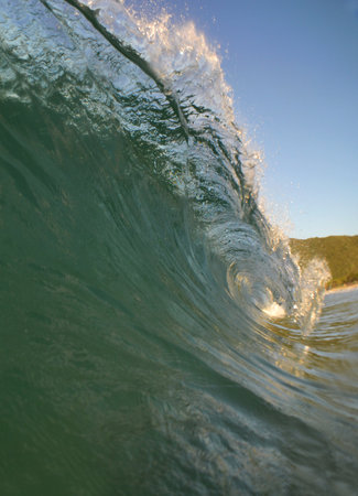 A beautiful wave on a beach on the coast of Venezuelaの写真素材