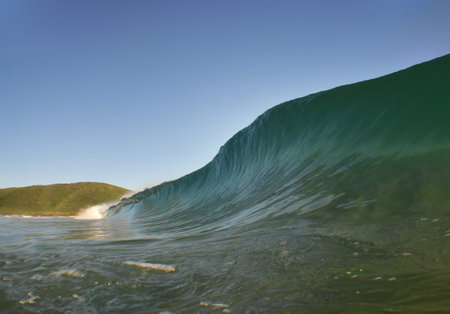 A beautiful wave on a beach on the coastの写真素材