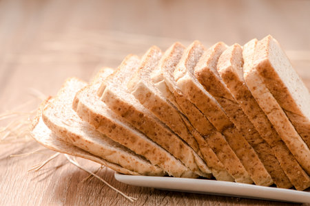 bread in plate on wood table