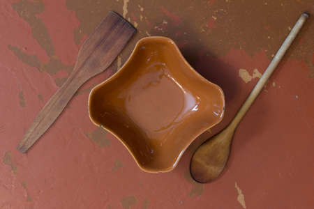An old rustic cutlery on the tableの写真素材